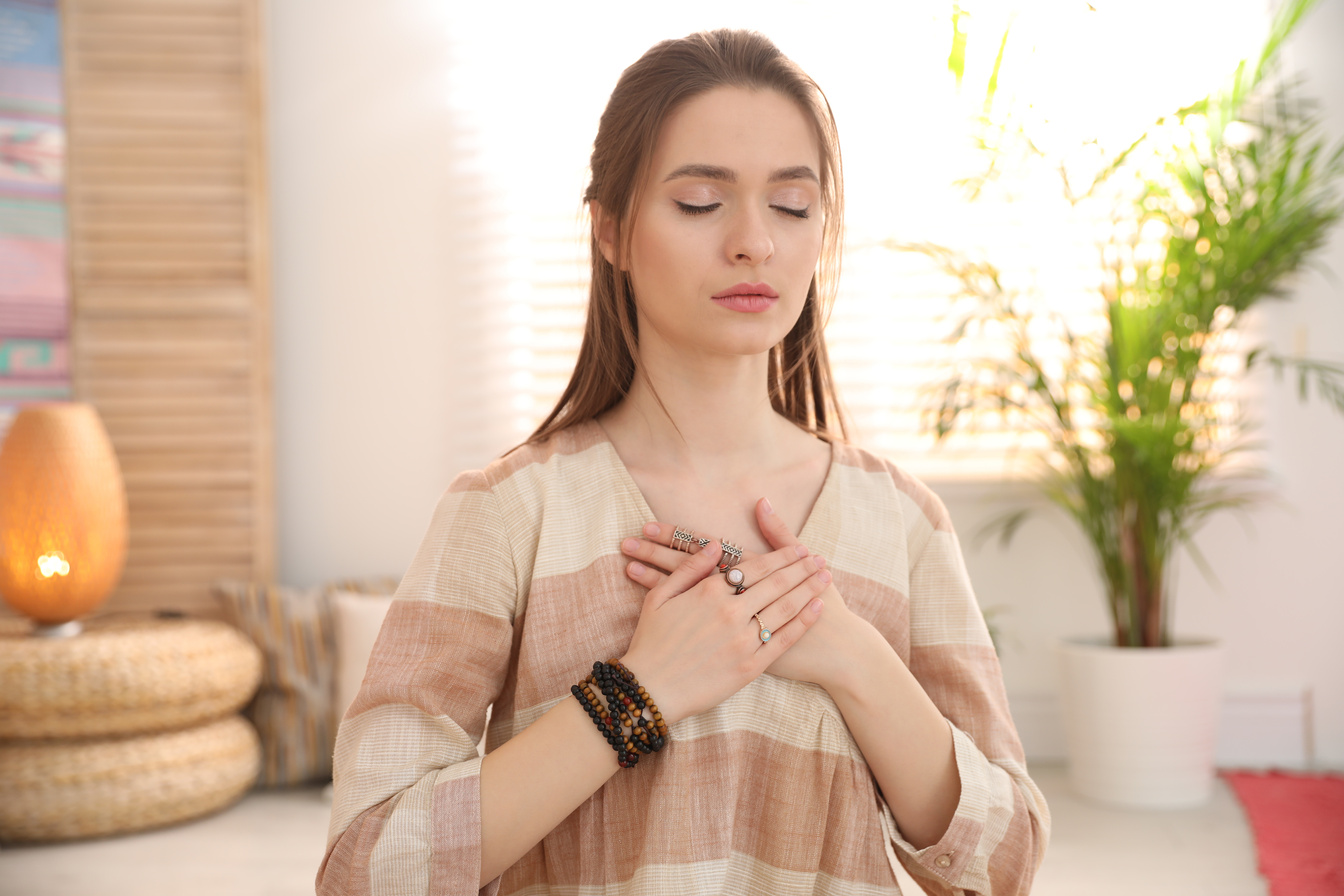 Young Woman during Self-Healing Session in Room